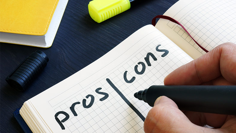 Writing a pros and cons list about life's big expenses and how to manage them.