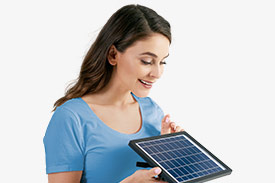 Feel Good Wealth Climate Action with a woman looking at a solar panel.